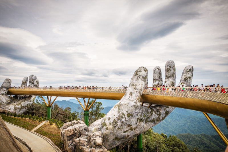 The Golden Bridge /Vietnamese: Cầu Vàng) is a pedestrian bridge located in the Sun World resort in Bà Nà Hills near Da Nang in Vietnam.